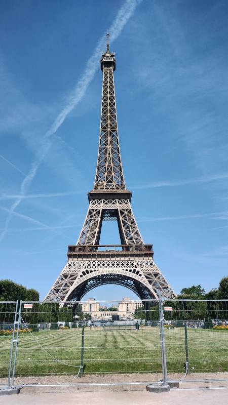 Eiffel Tower, and a lot of contrails